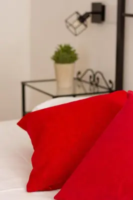 Letto o letti in una camera di Suite Garibaldi - Smart Holiday