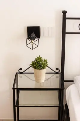 Letto o letti in una camera di Suite Garibaldi - Smart Holiday