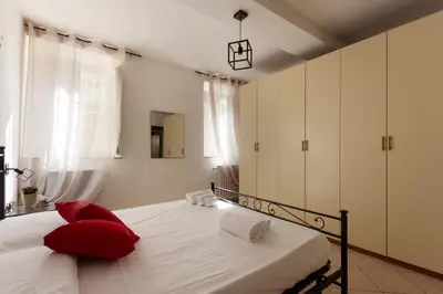 Letto o letti in una camera di Suite Garibaldi - Smart Holiday