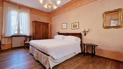 Letto o letti in una camera di Relais Vimercati
