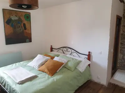 Letto o letti in una camera di Maison de village avec piscine au-dessus des Cinque Terre