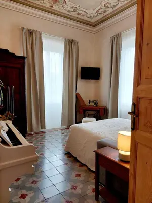 Letto o letti in una camera di Villa Ghiron