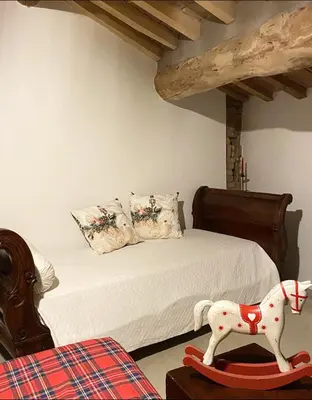 Letto o letti in una camera di Il Corvo Viaggiatore