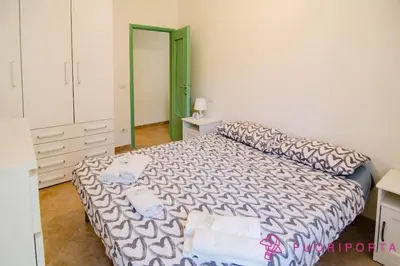 Letto o letti in una camera di FuoriPorta Affitti Brevi - Borgo Cocconi 33