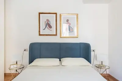 Letto o letti in una camera di Domus: modern Loft in the center of Parma