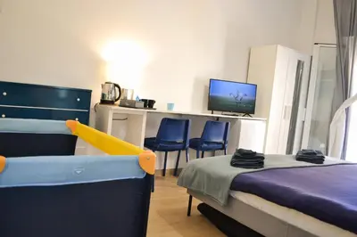 Letto o letti in una camera di Dolce Hogar Residence