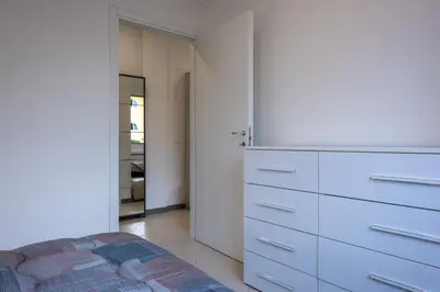 Letto o letti in una camera di GuestHost - Santo Stefano di Magra Modern Apartments