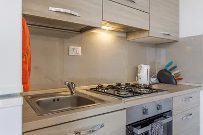 Cucina o angolo cottura di Appartamento vicino Ospedale con self check-in