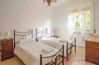 Letto o letti in una camera di FuoriPorta Affitti Brevi - Residence Dacci