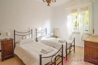 Letto o letti in una camera di FuoriPorta Affitti Brevi - Residence Dacci