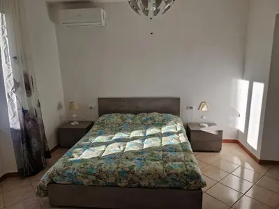 Letto o letti in una camera di La Casa sull'argine