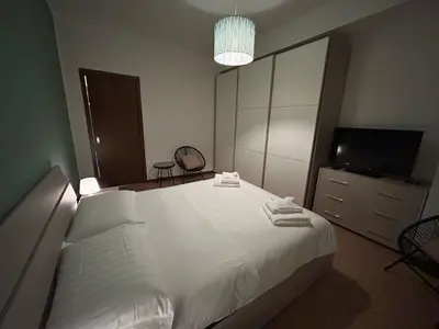 Letto o letti in una camera di 3T House 2 Casa Vacanze