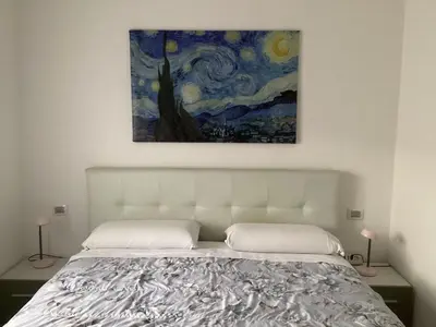 Letto o letti in una camera di Bed and Breakfast da Giuseppe, Camere vicino stabilimento Ferrari