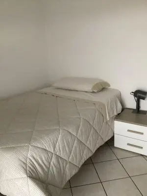 Letto o letti in una camera di Bed and Breakfast da Giuseppe, Camere vicino stabilimento Ferrari
