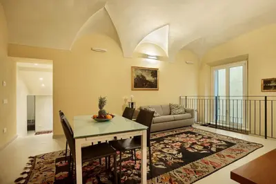 Area soggiorno di CHARMING APARTMENT IN PARMA/ TEATRO REGIO / WIFI