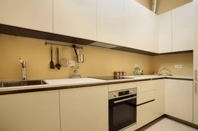 Cucina o angolo cottura di CHARMING APARTMENT IN PARMA/ TEATRO REGIO / WIFI