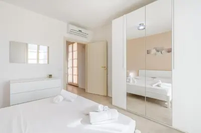 Letto o letti in una camera di Nour Apartments - Castramajora Alloggi
