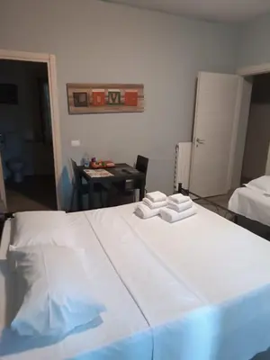 Letto o letti in una camera di Mono CHECKIN A RICHIESTA