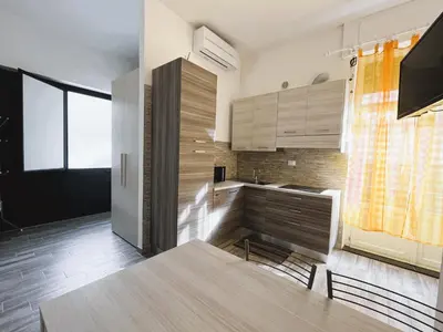 Cucina o angolo cottura di Monolocale con posto auto