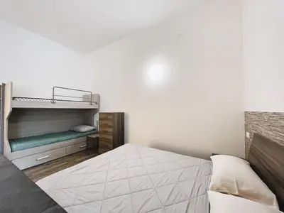 Letto o letti in una camera di Monolocale con posto auto