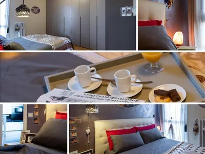 Letto o letti in una camera di Appartamento a Modena, comodo a tutti i servizi