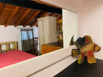 Letto o letti in una camera di Dante Appartamento con giardino