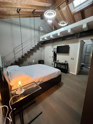 Letto o letti in una camera di V&B Suites and Apartments