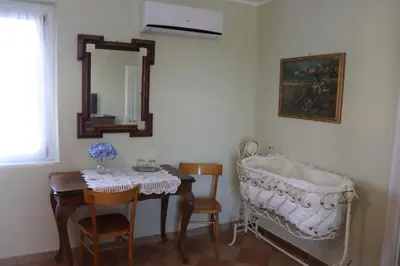 Letto o letti in una camera di Cascina Angelina