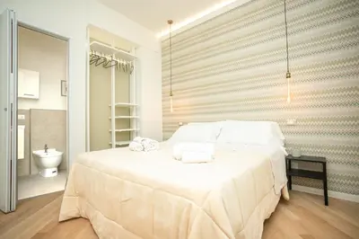 Letto o letti in una camera di Modena Centro Junior Suite