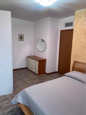 Letto o letti in una camera di Intero appartamento Parma Fiere