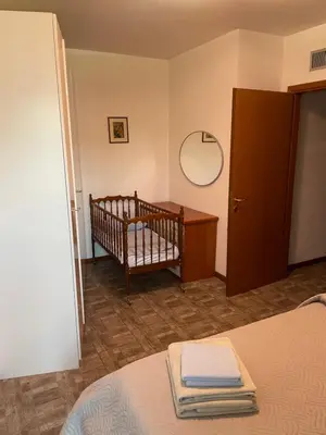 Letto o letti in una camera di Intero appartamento Parma Fiere