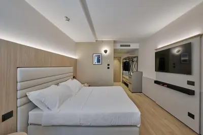 Letto o letti in una camera di RMH Modena Raffaello