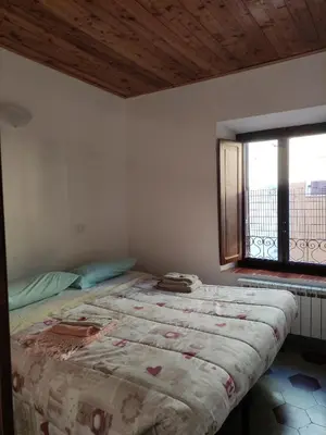 Letto o letti in una camera di Il ristoro del viandante