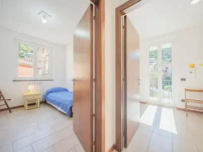 Letto o letti in una camera di Apartment Tulipano by Interhome