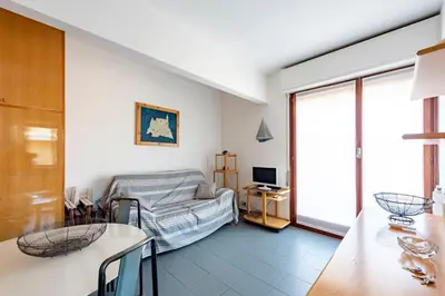 Area soggiorno di JOIVY Cosy flat with terrace near Rapallo Castle