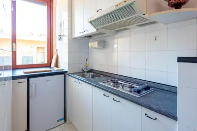 Cucina o angolo cottura di JOIVY Cosy flat with terrace near Rapallo Castle