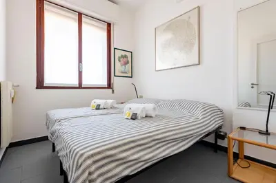 Letto o letti in una camera di JOIVY Cosy flat with terrace near Rapallo Castle