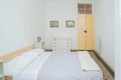 Letto o letti in una camera di 057 - Casa Portobello, Centrale a 50 metri dal mare