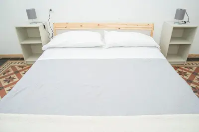 Letto o letti in una camera di 057 - Casa Portobello, Centrale a 50 metri dal mare
