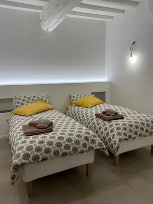 Letto o letti in una camera di CasaDea
