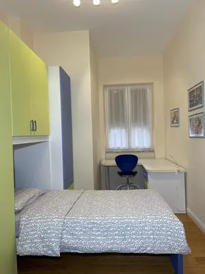 Letto o letti in una camera di Casa Linda