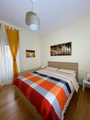 Letto o letti in una camera di Casa Linda