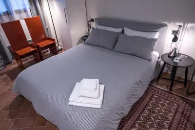 Letto o letti in una camera di B&B Maria Teresa