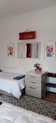 Letto o letti in una camera di Casa SARA FIDENZA
