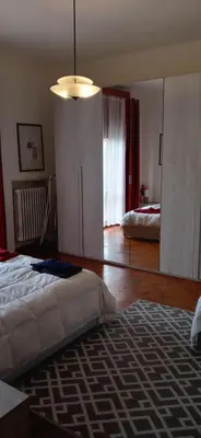 Letto o letti in una camera di Casa SARA FIDENZA