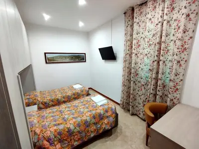 Letto o letti in una camera di Hotel Da Bruno