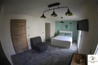 Letto o letti in una camera di Antica Locanda Bonfiglio