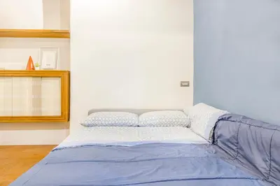 Letto o letti in una camera di [A 2 passi da Piazza Grande]