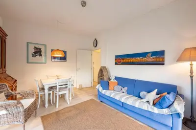 Letto o letti in una camera di JOIVY Stylish flat with balcony near Rapallo Castle