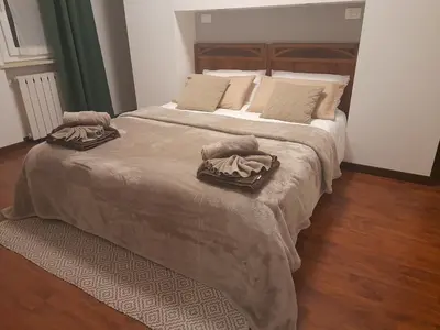 Letto o letti in una camera di Domus Flavia